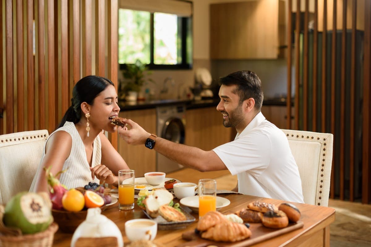 Guests sharing a slow morning breakfast at a Nistula villa in Goa.